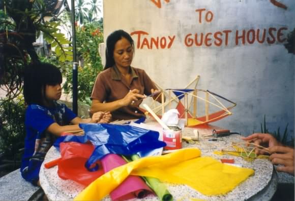Tanoy's mother making lanterns for the Water Festival